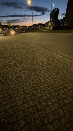Evening street scenes documented across Bragança, Portugal at dusk