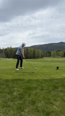 Golfer plays under overcast skies in Sylling, Norway