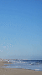 LAPD helicopter patrols above busy Santa Monica Beach