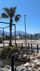 Morning scenes captured in Fethiye town square with statue