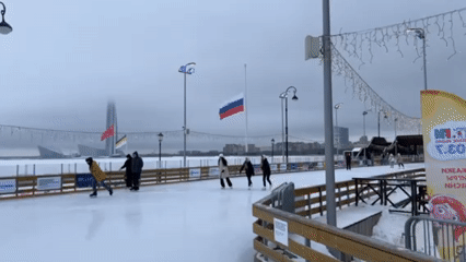 Winter ice skating observed in Saint Petersburg amid overcast skies