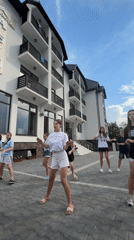 Dance rehearsals and performances outside a Solotvyno hotel