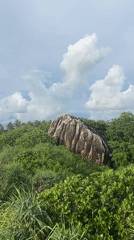 Group poses for photos on Balapitiya beach rocks