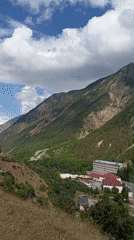 Mountain village life in Neitrino, Russia — infrastructure, livestock, and alpine scenery