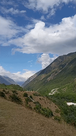 Mountain village life in Neitrino, Russia — infrastructure, livestock, and alpine scenery