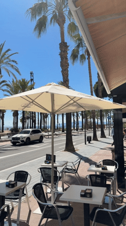 Sunny afternoon street scene captured in Salou, Spain
