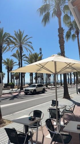 Sunny afternoon street scene captured in Salou, Spain