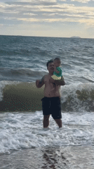 Pattaya beach life: surf, families, and shoreline details
