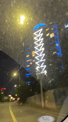 Driver records nighttime road view through dirty windshield in Sofia
