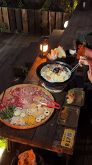 Outdoor rooftop dining scene captured in Nan'an District