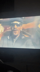 Person watches music video on TV in Rubuchi home