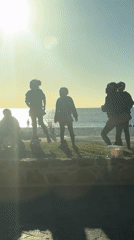 Cape Town beach cafe scene with girls, BMWs captured
