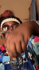 Fashion-forward individual showcases eclectic style in Nigerian village