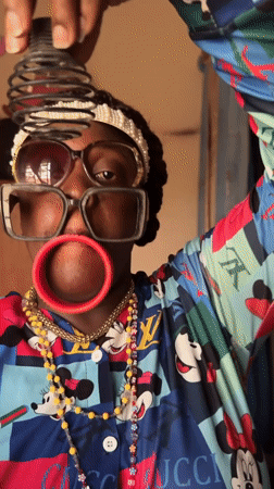 Fashion-forward individual showcases eclectic style in Nigerian village