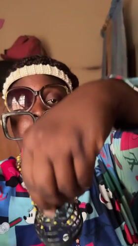 Fashion-forward individual showcases eclectic style in Nigerian village