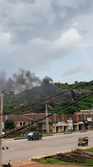 Hillside fire and formal photo shoot in central Nigeria