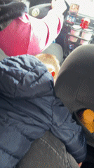 Woman in pink drives through Madan, Bulgaria