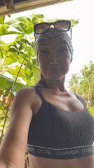 Woman takes early morning selfie in Baan Hua Thanon