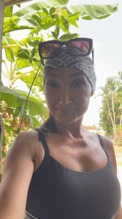Woman takes early morning selfie in Baan Hua Thanon