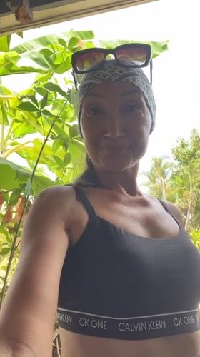 Woman takes early morning selfie in Baan Hua Thanon