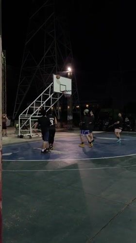 Evening pickup sports across Chang Phueak's outdoor courts