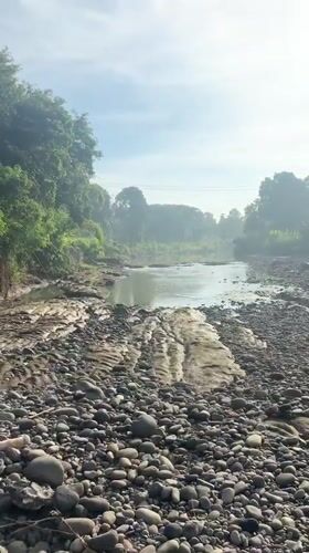 Low water levels expose rocky riverbed in Bali