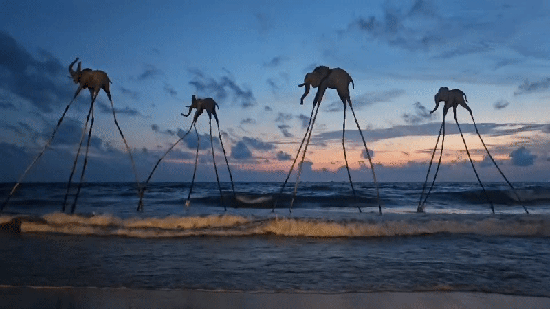Surreal beach sculptures line the Phú Quốc shore at dusk