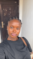 Woman observed near fenced urban area with metal structures