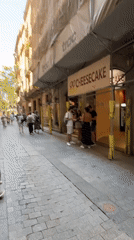 Ordinary street life documented across Barcelona neighborhoods Thursday afternoon