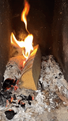 Wood stove burns in Chaikovsky, Russia morning hours