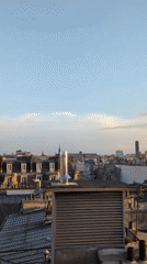 Witness captures golden hour views of Paris rooftops, streets