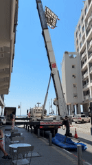 Tel Aviv morning: crane work, a selfie, and lunch
