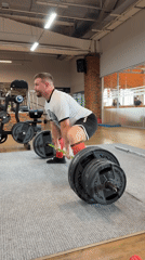 Heavy deadlift session at a gym in Chaikovsky, Russia