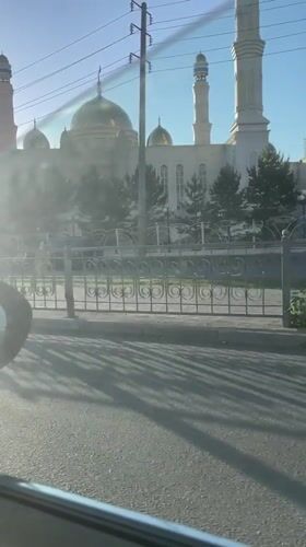 White mosque with golden domes filmed in Kokshetau, Kazakhstan