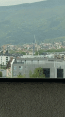 Crane lifts blue metal structure in Sofia morning construction