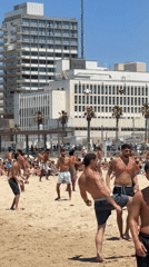 Tel Aviv beach bustles with morning activity May 1