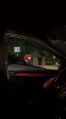 Two people celebrate with sparklers in Izhevsk evening