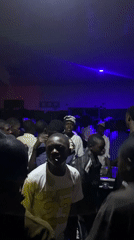 Young people gather for evening party with DJ and dancing