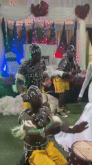 Traditional Nigerian wedding celebration features cultural dancers and ceremonies