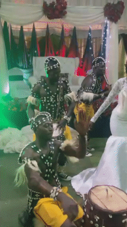 Traditional Nigerian wedding celebration features cultural dancers and ceremonies