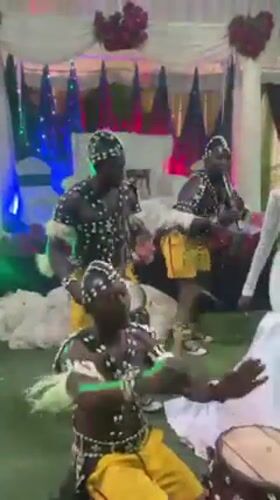 Traditional Nigerian wedding celebration features cultural dancers and ceremonies