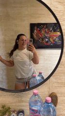 Mirror selfie moment in Plovdiv, pink phone in hand