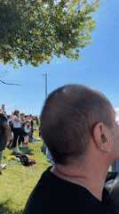 Traditional folk dancers perform for crowds in Sofia park