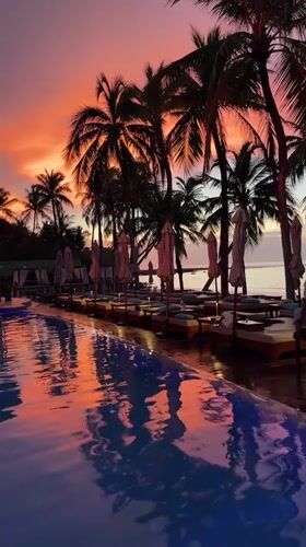 Sunset at a Choeng Thale resort, poolside and beach views