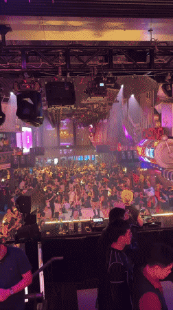 Packed nightclub night in Thủ Đức with live performances and DJs
