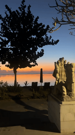 Sunrise over Sanur Beach with Mount Agung on the horizon