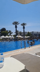 Resort pool scene documented in Kuşadası, Turkey