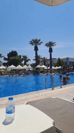 Resort pool scene documented in Kuşadası, Turkey