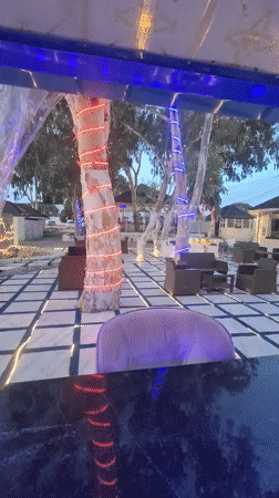 Evening leisure venue captured with pool decorations and lounge