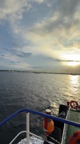 Ferry passenger witnesses sunrise over Ketapang waters